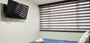 Habitación cerca Parque Simón Bolívar Aeropuerto Movistar Arena