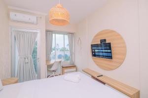 Homey 1BR without Living Room at Gunung Putri Square Apartment By Travelio
