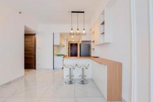Spacious and Nice 3BR at Sky House BSD Apartment By Travelio