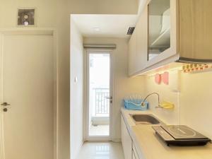 Fancy and Nice 2BR Apartment at Parahyangan Residence By Travelio