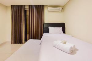 New and Nice 2BR at Marquis De Lafayette Apartment By Travelio