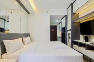 Homey and Nice Studio at Transpark Bintaro Apartment By Travelio