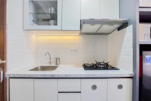 Homey and Nice Studio at Transpark Bintaro Apartment By Travelio