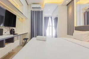 Homey and Nice Studio at Transpark Bintaro Apartment By Travelio