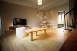 Appartements Soft Wood - Duplex - Historique : photos des chambres