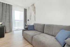 Nowa Letnica Apartment with Balcony & Parking Arena Gdańsk by Noclegi Renters