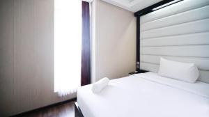 Strategic and Comfy 2BR Apartment at Trillium Residence By Travelio