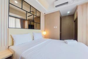 Exclusive and Homey 2BR Transpark Bintaro Apartment By Travelio