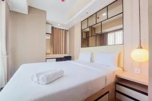 Exclusive and Homey 2BR Transpark Bintaro Apartment By Travelio - Mencil