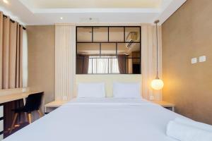 Exclusive and Homey 2BR Transpark Bintaro Apartment By Travelio