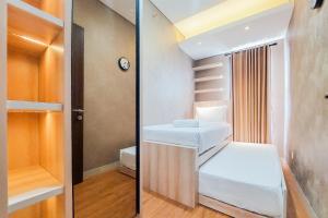 Exclusive and Homey 2BR Transpark Bintaro Apartment By Travelio