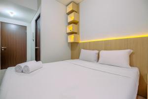 Good Choice and Restful Studio at Transpark Cibubur Apartment near Mall By Travelio