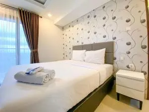 Restful and Elegant 1BR Patraland Amarta Apartment By Travelio - 马格朗