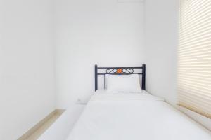 Fully Furnished with Cozy Designed 2BR Serpong Garden Apartment By Travelio
