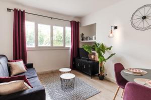 Appartements Les Sorbiers - CENTRE VILLE - Spacieux & Climatisation : photos des chambres
