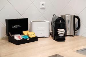 Appartements Les Sorbiers - CENTRE VILLE - Spacieux & Climatisation : photos des chambres