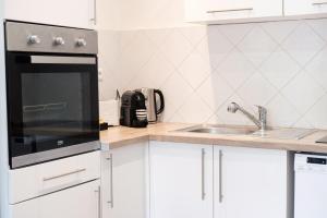 Appartements Les Sorbiers - CENTRE VILLE - Spacieux & Climatisation : photos des chambres