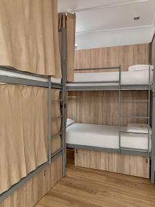 Bed in 4-Bed Standard Dormitory Room with Bathroom room in La Banda Rooftop Hostel