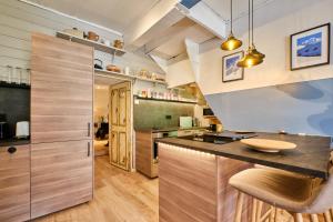 Maisons de vacances Jacuzzi Sauna Terrasse Venosc : photos des chambres