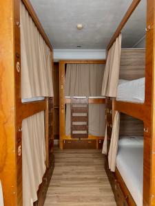 Bed in 6-Bed Dormitory Room with Shared Bathroom room in La Banda Rooftop Hostel