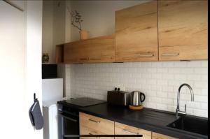 Appartements -Petit Beguin- au coeur d-Uzes : photos des chambres