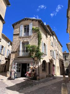 Appartements -Petit Beguin- au coeur d-Uzes : photos des chambres