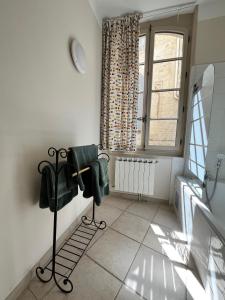 Appartements -Petit Beguin- au coeur d-Uzes : photos des chambres