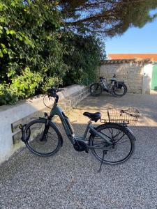 Maisons de vacances Petite maison dans le jardin : photos des chambres