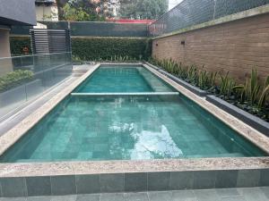 Apartamento entero de 3 habitaciones con camas Queen en zona 10