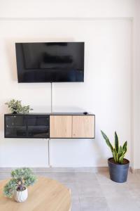 Oikía - Refined City Living