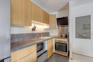 Appartements T2 Jardin cosy et lumineux proche Paris : photos des chambres