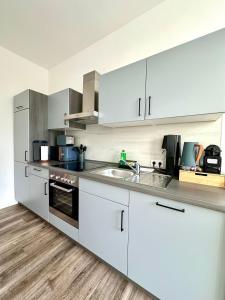 Ferienwohnung am Harz mit Küche, Balkon, Waschmaschine, Parkplatz mit Wallbox