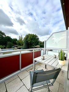 Ferienwohnung am Harz mit Küche, Balkon, Waschmaschine, Parkplatz mit Wallbox