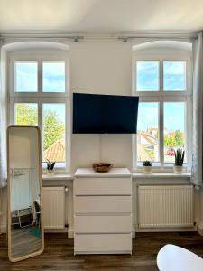 Ferienwohnung am Harz mit Küche, Balkon, Waschmaschine, Parkplatz mit Wallbox