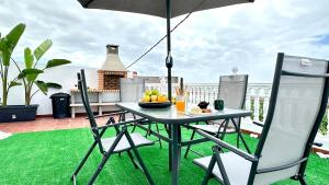 Maravilloso ático con terraza, vistas, BBQ, wifi