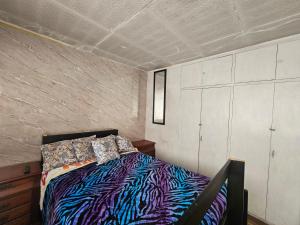 HABITACION COLISEO DEPORTES AMBATo