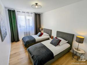 Appartements Les Magnolias - Calme - Confort - Parking - Tram : photos des chambres