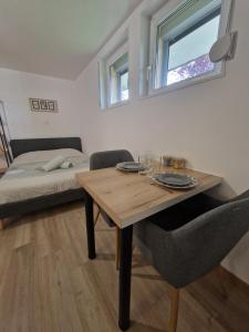 Appartements L'independant - place de parking - wifi : photos des chambres