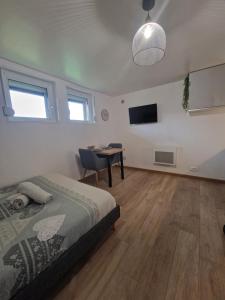 Appartements L'independant - place de parking - wifi : photos des chambres