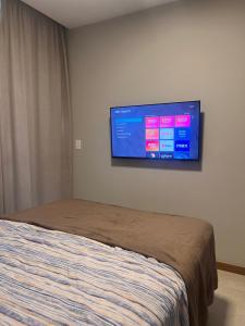 ESPETACULAR!! Apto na PRAIA DE ITAPARICA - Com Wi-Fi 360mbps, Ar Condicionado, Estacionamento, Globoplay e Cozinha Completa