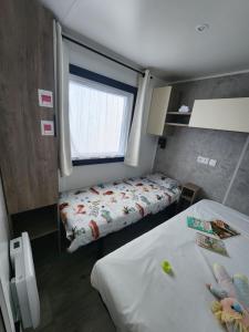 Campings Mobil-home climatise a Valras Plage dans le camping 4 etoiles les Sables du midi a 800m de la plage : photos des chambres