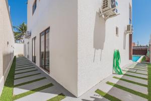 Casa Guerreiro - Elegância no Cumbuco by Carpediem