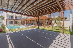 Casa Guerreiro - Elegância no Cumbuco by Carpediem