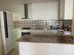 Apartamento pé na areia