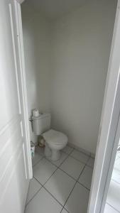 Appartements Appartement de L : photos des chambres