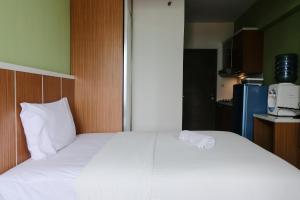 Best Deal Studio at Harvard Jatinangor Apartment By Travelio