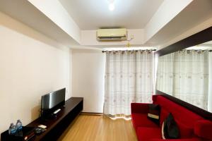 Elegant and and Spacious 1BR The Wave Kuningan Apartment By Travelio