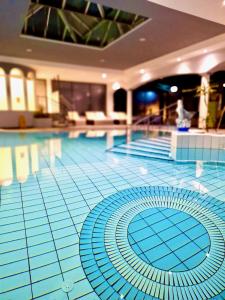 Apartments C'EST LA SEA - Whirlpool-Suite oder Dachterrassen-Suite - Pets welcome - 4hvězdičkové hotely ve městě Neusiedl am See