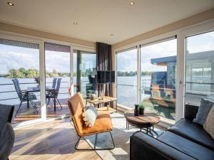 Houseboat with edge of a holiday park