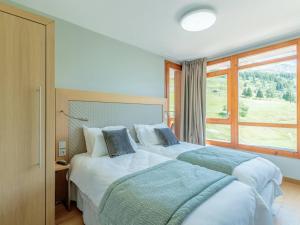 Duplex moderne 3 Chambres - Balcon, Piscine, Spa, Ski aux pieds - FR-1-352-57